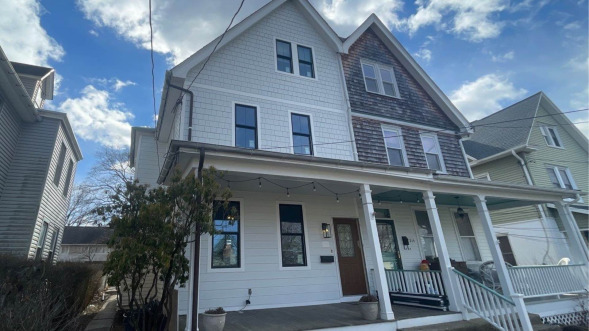 Jenkintown home refreshed with white shingle siding by Porter Exteriors
