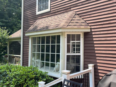 Bay window with Andersen windows installed by Porter Family Exteriors