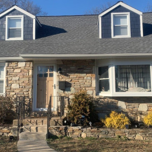 Bow windows installed on a home by Porter Family Exterior.
