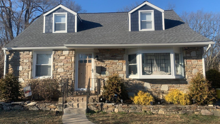 Bow windows installed on a home by Porter Family Exterior.