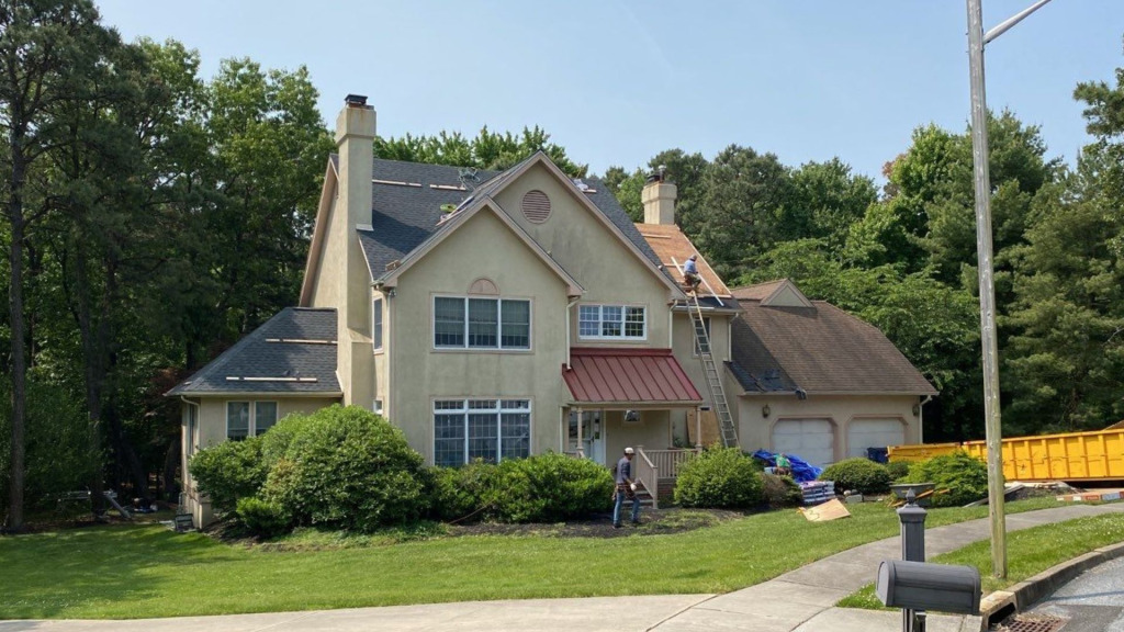 A Voorhees, NJ home undergoing a roof replacement and closed skylight integration.