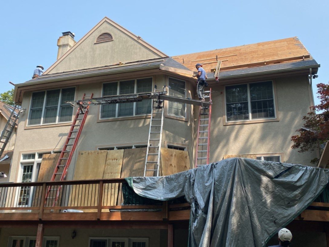 A Voorhees, NJ home undergoing a roof replacement and closed skylight integration.