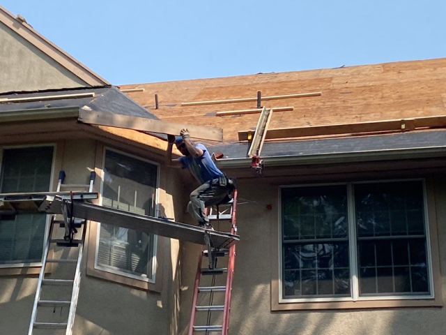 A Voorhees, NJ home undergoing a roof replacement and closed skylight integration.