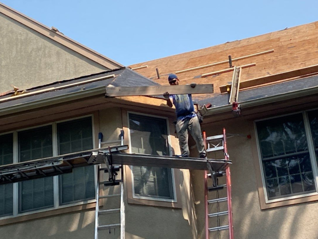 A Voorhees, NJ home undergoing a roof replacement and closed skylight integration.