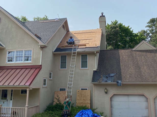 A Voorhees, NJ home undergoing a roof replacement and closed skylight integration.
