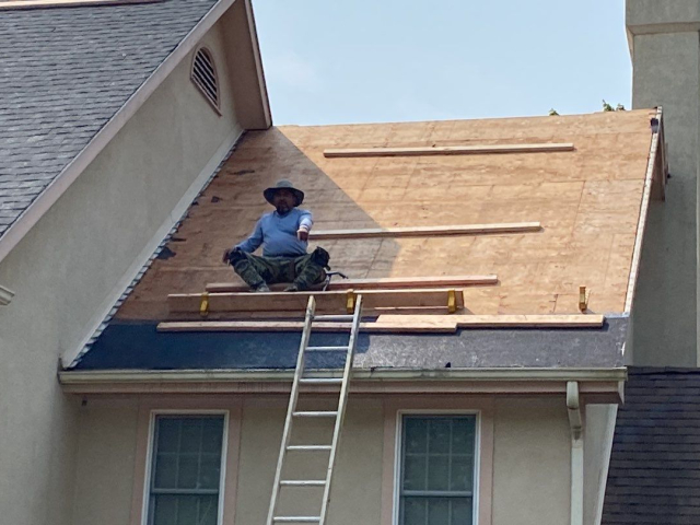 A Voorhees, NJ home undergoing a roof replacement and closed skylight integration.