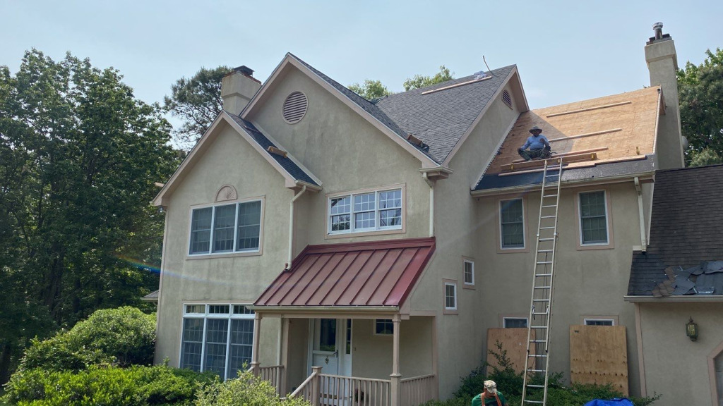 A Voorhees, NJ home undergoing a roof replacement and closed skylight integration.