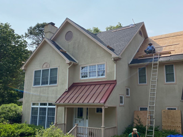A Voorhees, NJ home undergoing a roof replacement and closed skylight integration.