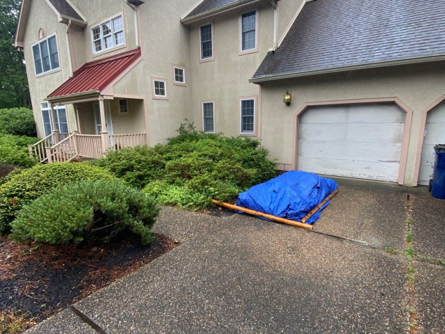 A Voorhees, NJ home undergoing a roof replacement and closed skylight integration.