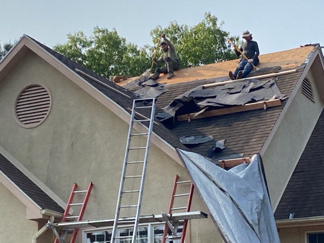 A Voorhees, NJ home undergoing a roof replacement and closed skylight integration.
