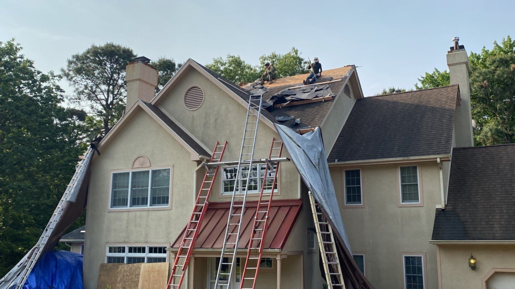 A Voorhees, NJ home undergoing a roof replacement and closed skylight integration.