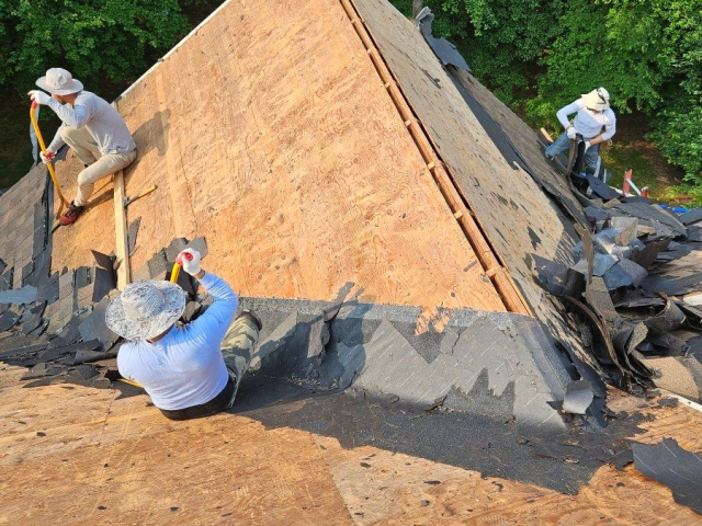 A Voorhees, NJ home undergoing a roof replacement and closed skylight integration.