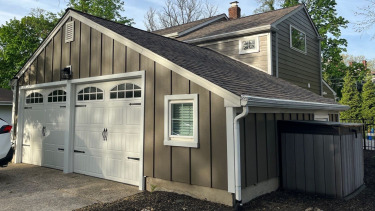 A home in New Jersey with brand new James Hardie board and batten siding.
