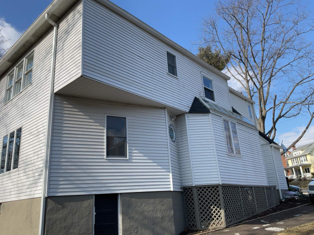 2-Feb 25, 2025 20-42-34-xrv3 1920s-tudor-hardie-siding-custom-portico Historic 1920s Tudor Prior to Being Upgraded With Hardie Siding and Custom Portico Design