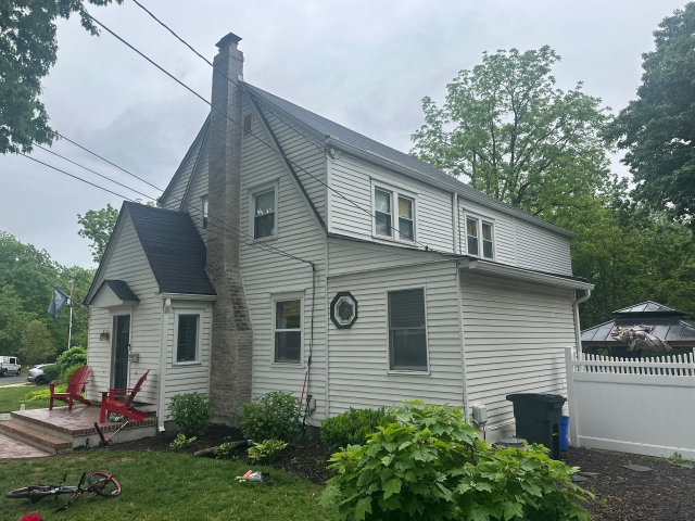 6-May 13, 2025 12-49-57-cnza 1920s-tudor-hardie-siding-custom-portico Historic 1920s Tudor Prior to Being Upgraded With Hardie Siding and Custom Portico Design