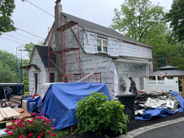 8-May 16, 2025 12-58-56-KQ94 1920s-tudor-hardie-siding-custom-portico Historic 1920s Tudor Being Upgraded With Hardie Siding and Custom Portico Design