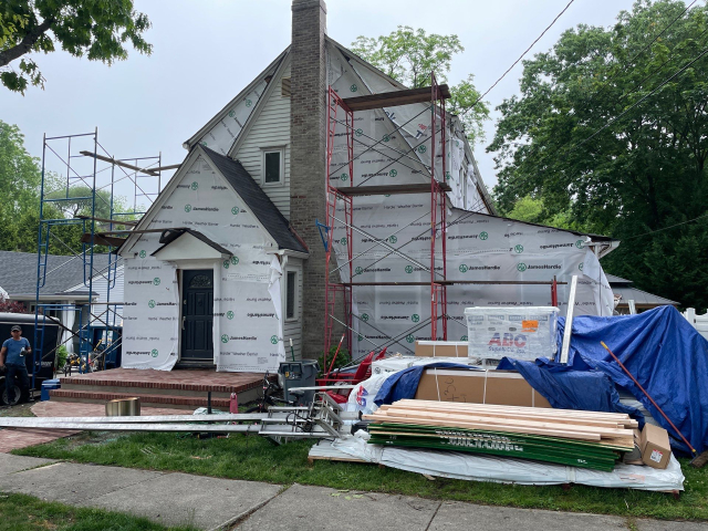 9-May 16, 2025 12-59-07-fnXs 1920s-tudor-hardie-siding-custom-portico Historic 1920s Tudor Being Upgraded With Hardie Siding and Custom Portico Design