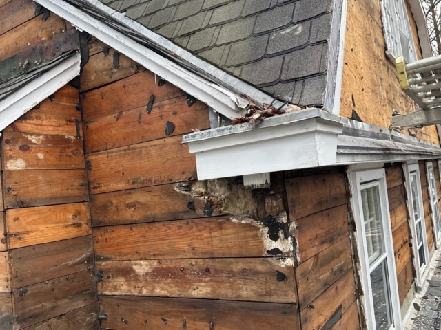 Old wood siding exposed during a Gladwyne PA exterior renovation before James Hardie siding installation
