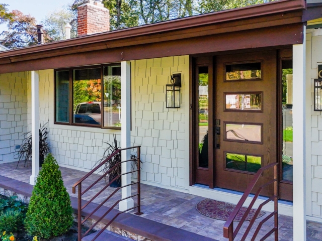 Front entry with staggered shake siding and finished trim in Medford NJ