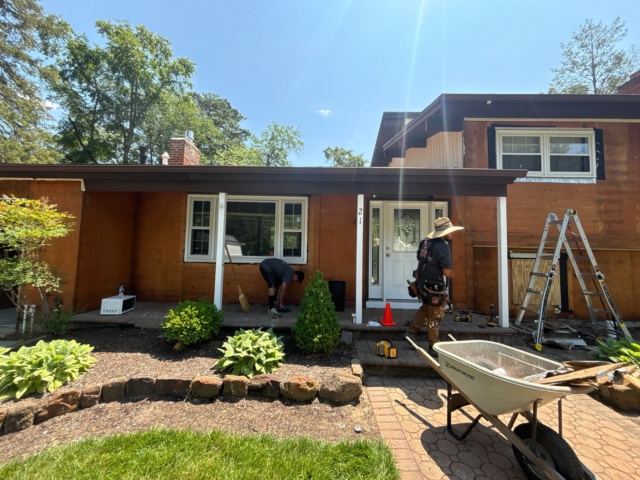 Front exterior siding removal in progress at Medford NJ renovation project