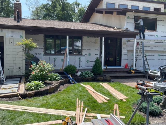 Porter Exterior preparing upper window openings during Medford NJ exterior renovation