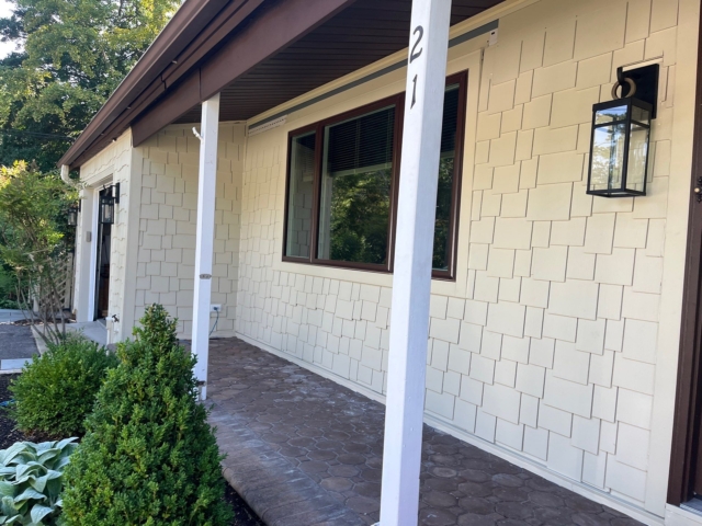 Staggered shake siding and new front windows on Medford NJ home renovation